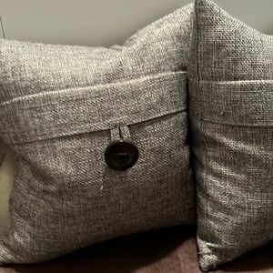 Grey feather cushions (pair)